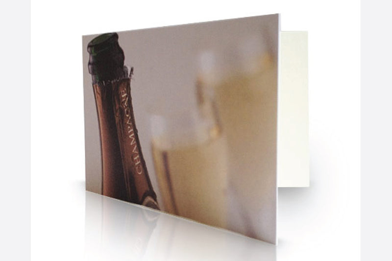 Half bottle of corporate branded champagne gift wrapped with card